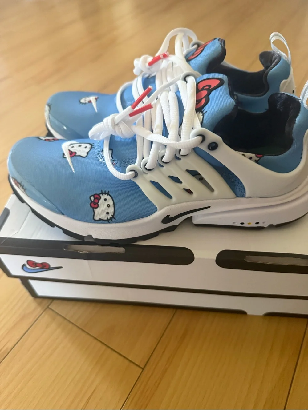 Nike Big Kids Light Blue Hello Kitty Graphic Sneakers with White Accents